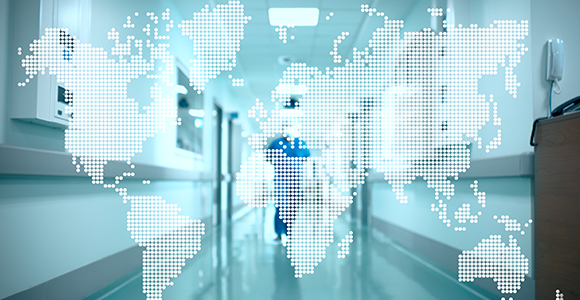 a tone dot world map overlaid on a hospital corridor 